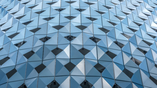 The side of a hive patterned building for Tetra Tech’s building surveying services
