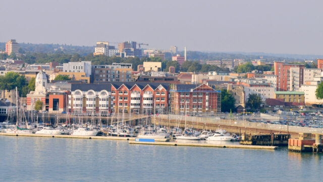 Waterfront harbor with city skyline