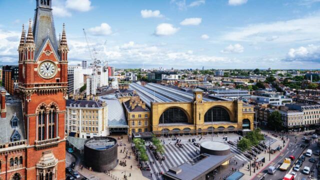 London skyline at Kings Cross station bustling with traffic