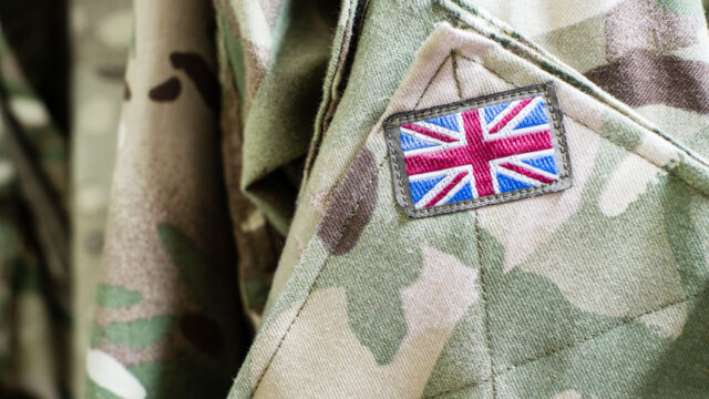 A close up image of soldier's uniform displaying the Union Jack Flag