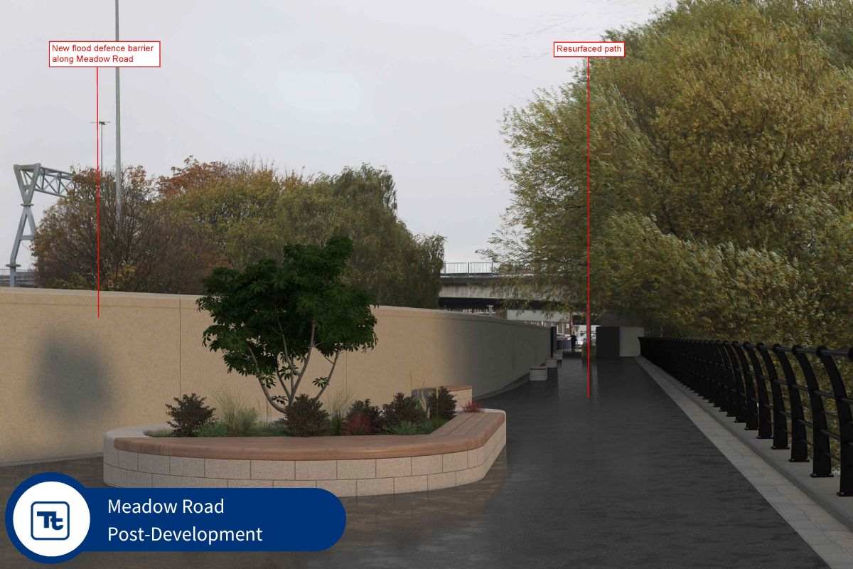 An image of Meadow Road after development, featuring a newly resurfaced pathway alongside a flood defense barrier. The scene includes a landscaped area with small plants and trees, and a modern railing along the path. Signs indicate the new flood defense barrier and the resurfaced path.